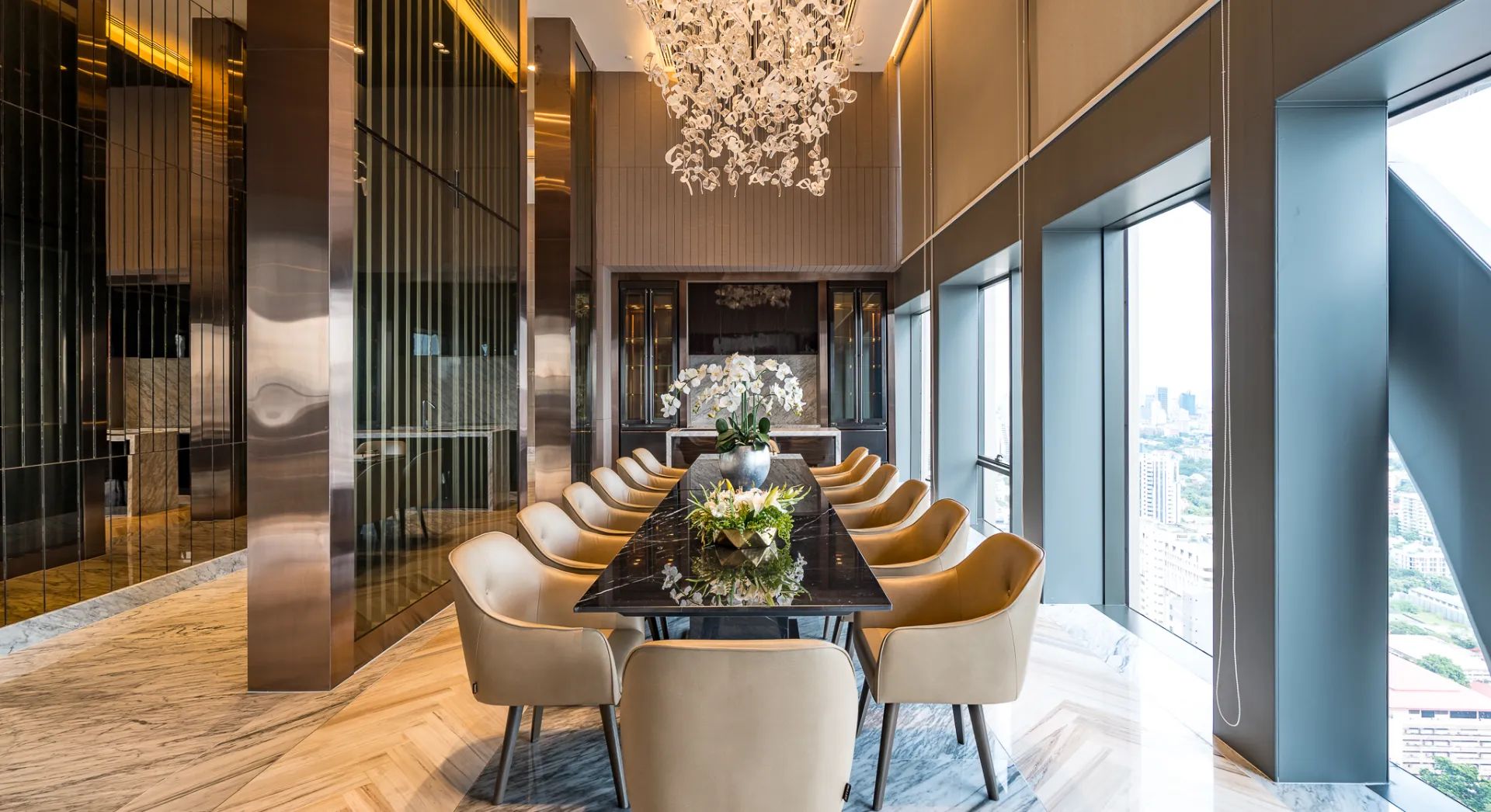 Shared dining and meeting area at The Esse at Singha Complex