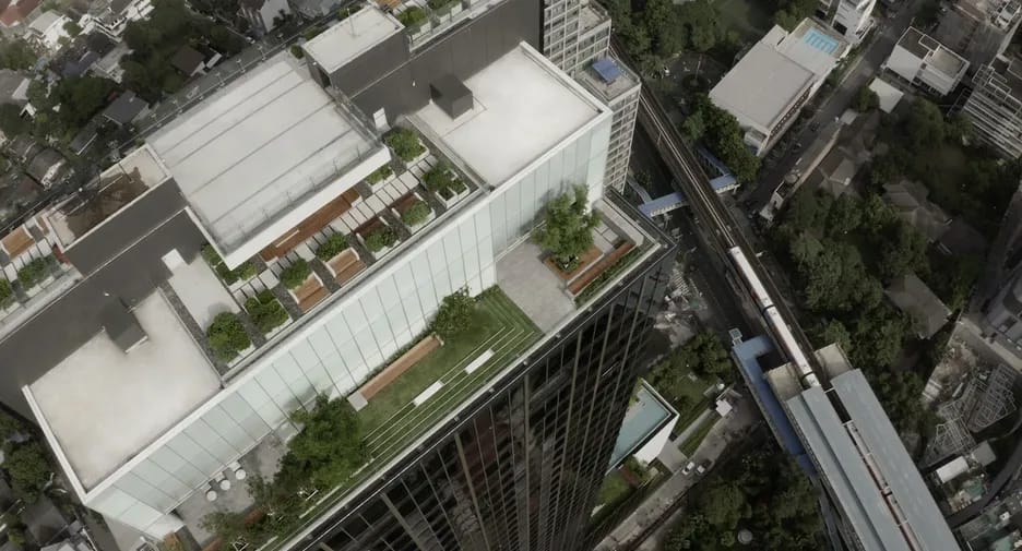 Aerial view of The Esse Sukhumvit 36 rooftop terraces beside Sukhumvit Road