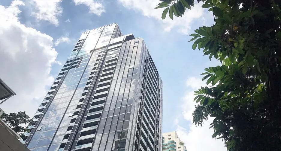 CELES Asoke condominium tower viewed from street level in Bangkok