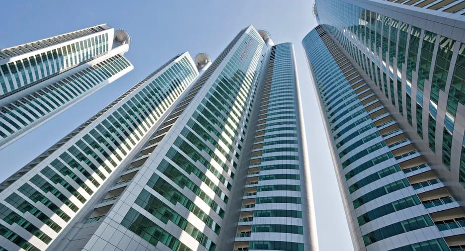 Millennium Residence towers viewed from below in Bangkok
